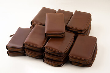 Elegant brown multipurpose leather wallet isolated on white background, perfect for leather product catalog design