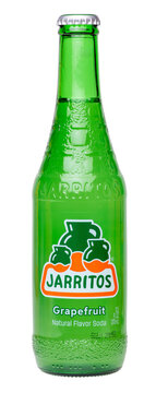 Bottle of Mexican Jarritos brand grapefruit flavored  soda isolated on a transparent background PNG	
