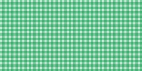 Naklejka premium Green gingham checkered pattern background. Seamless green plaid design, perfect for fabric, textile, scrapbooking, and cute digital projects. Soft and sweet vintage aesthetic.