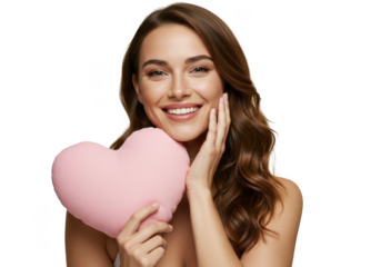 Beautiful woman holding a pink heart pillow isolated on transparent background
