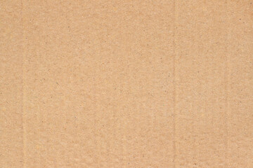 Fototapeta premium Brown cardboard sheet abstract background, texture of recycle paper box in old vintage pattern for design art work.