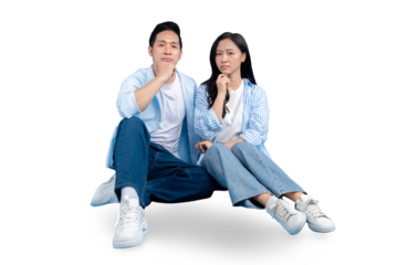 A couple sitting together looking serious and contemplating on PNG background