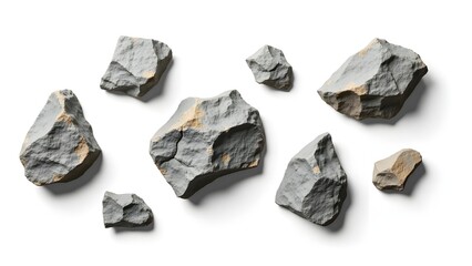 Flat lay rugged mountain rocks with sharp textures and cracks isolated on clean white background