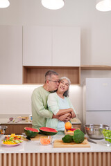 Older Asian Couple Hugging Kitchen Prepare Healthy Meal Together Happy Retirement Lifestyle Cooking