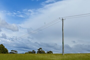 Electricity power pole and line in rural country Australia