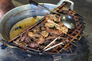 Pawon Traditional Kitchen, captured on August 28, 2025. Classic Javanese kitchen with clay stove, firewood, and earthenware pots, rustic atmosphere reflecting Indonesia’s cultural culinary heritage
