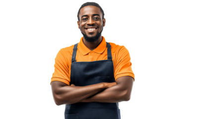 Smiling Black man wearing an orange polo shirt and dark apron with arms crossed, cut out transparent