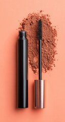 Obraz premium A mascara tube and applicator against a backdrop of powder.