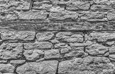 Stone wall background in black and white close up view