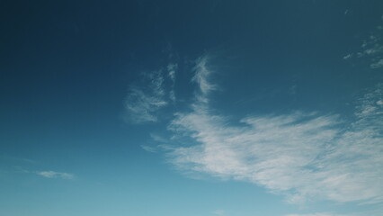 Time lapse. A Beautiful and Enchanting Cloudy Sky with a Tranquil Blue Background Enveloping the...