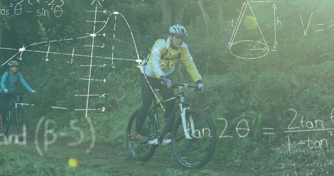Pedaling adult man wearing yellow jacket and helmet along forest trail, with math overlay - Powered by Adobe