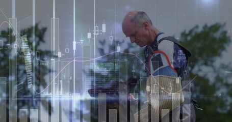 Arborist wearing sleeves and harness checking tablet in orchard with financial charts, copy space