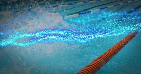 Male swimmer diving off pool edge, generating bioluminescent trail visualizing technology effect - Powered by Adobe