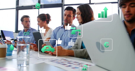 Team wearing business casual analyzing data in meeting room, with laptops, charts, digital icons