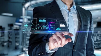 Futuristic video concept showing a businessman interacting with virtual screens. Low-angle shot emphasizes technology and innovation in a corporate setting. - Powered by Adobe