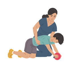 Female physiotherapist helping boy with ab roller exercise for core rehabilitation