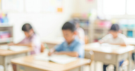 Blurred image of children sitting at desks in a classroom setting, reflecting joyful academic atmosphere with lively environment and engaging educational mood.