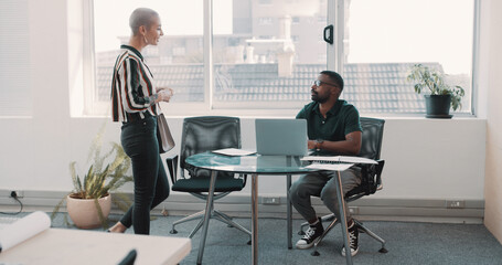 Business, people and talking in office with arrival for appointment, meeting or career opportunity. Creative agency, job seeker and employee at desk with networking, company questions and discussion