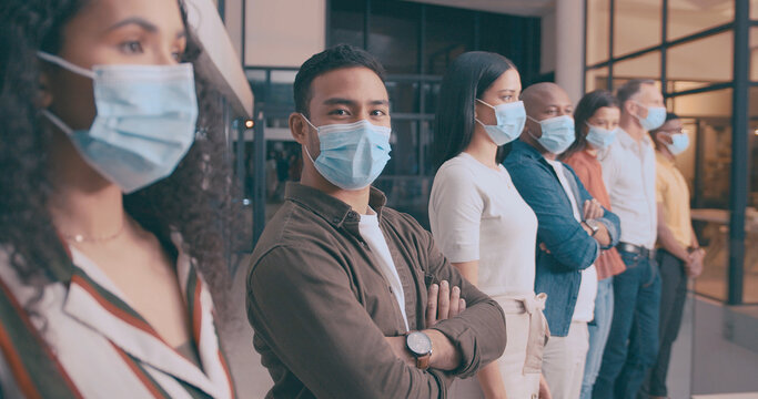 Team, row and business people with face mask in office for social distance, talking and safety. Portrait, ppe and group of employees with health protocol, policy or stop virus together in workplace. - Powered by Adobe