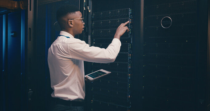 Administration, cybersecurity and tablet with black man in server room for network maintenance. App, firewall and mainframe with tech support employee in data center for backup, storage or update