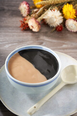 Traditional sweet soup dessert from Guangdong and Guangxi, China, sesame and peanut paste combination
