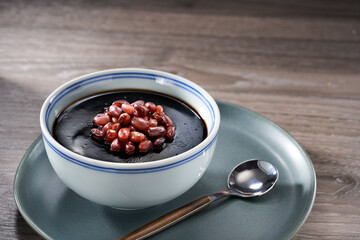 Traditional sweet soup dessert from Guangdong and Guangxi, China, tortoise jelly with red beans