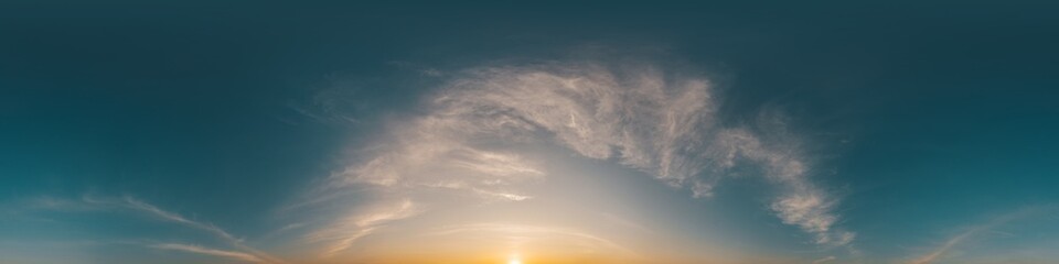 360 panorama of glowing sunset sky with bright Cirrus clouds. HDR 360 seamless spherical panorama. Full zenith or sky dome sky replacement for aerial drone panoramas. Climate and weather change.