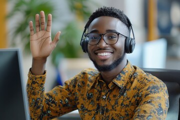Smiling man in a headset waving during an online video call in a modern office, capturing a moment of friendly professional interaction, Generative AI