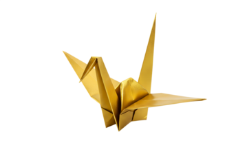 gold origami crane on white background symbolizing peace and craftsmanship