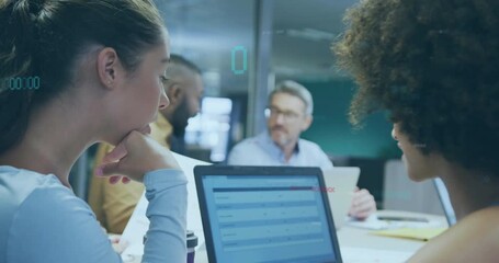 Colleague lifting pen, pointing at laptop chart prompts studying data overlays in business meeting - Powered by Adobe