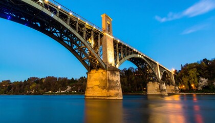 Metal Arch Bridge at Dusk, River Reflection