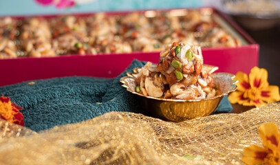 Dry fruit sweet dessert beautifully decorated on a background 