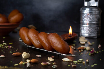 gulab jamun sweet spongy fried indian dessert 