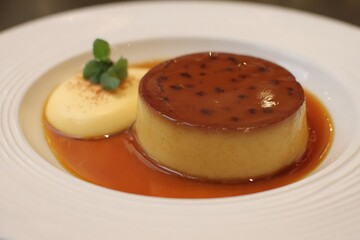 Creamy flan served with a side of whipped cream.