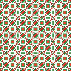 seamless geometric pattern. A complex and geometric seamless pattern with a festive red, green, and white color scheme.