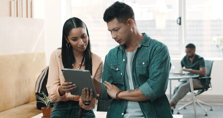 Creative, manager and woman with tablet, office or feedback for article draft, online or discussion. Teamwork, man and helping intern with project, journalist and reading story on website in newsroom