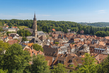 Scenic European town with church steeple and terracotta rooftops architecture
