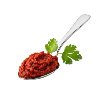Polished silver tablespoon with deep crimson harissa paste and vibrant cilantro sprig, on pristine transparent background with soft studio lighting and no shadows, professional food product
