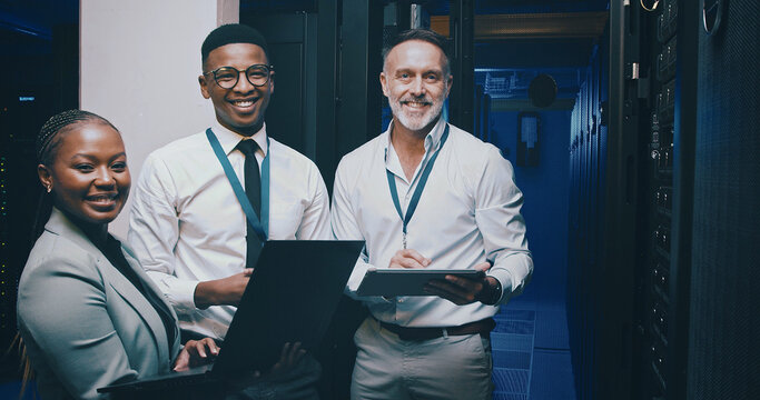 Team, server room and portrait of happy people on tech for IT support, cybersecurity and database. Laptop, collaboration and men with woman with pride for diagnostics, technician service and career