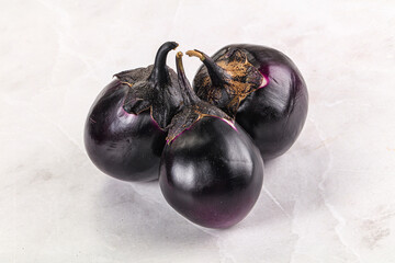 Raw violet and black eggplant