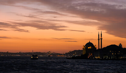 Naklejka premium Grand Mecidiye Mosque Ortakoy at night. History of Istanbul, Turkey