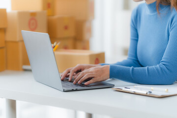 Online Business Owner Working on Laptop