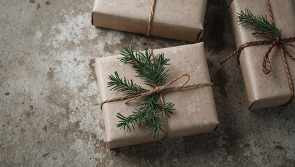 Rustic Christmas Presents Wrapped in Brown Paper with Twine and Evergreen Sprigs.