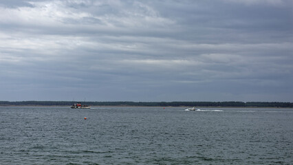 The Waverley Paddle Steamer seen in the Tay Estuary with its attendant Pilot Boat astern of it on the 27th August as it departs Dundee.