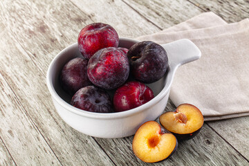 Ripe sweet juicy plum heap