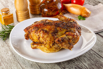 Baked in oven whole chicken with spices