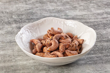 Unpeeled cashew nuts in the bowl