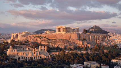 Fototapeta premium Ancient Acropolis of Athens with Parthenon temple at sunset, historic landmark and popular travel destination in Greece.
