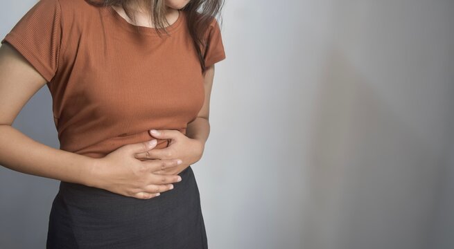 Myanmar Young Woman Suffering from Abdominal Pain