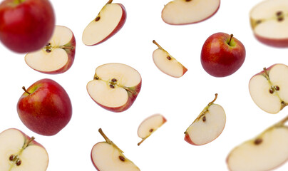 red apples and apple slices on white background